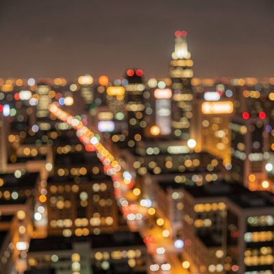 an out of focus city at night in warm tones