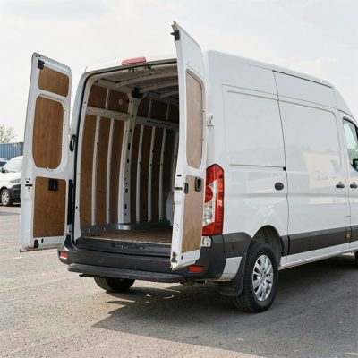 a delivery van with the rear doors open, no license plate