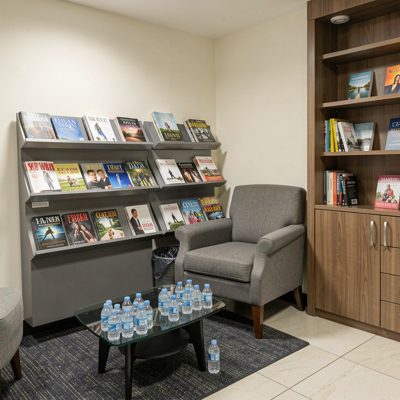 waiting area stocked with magazines and water