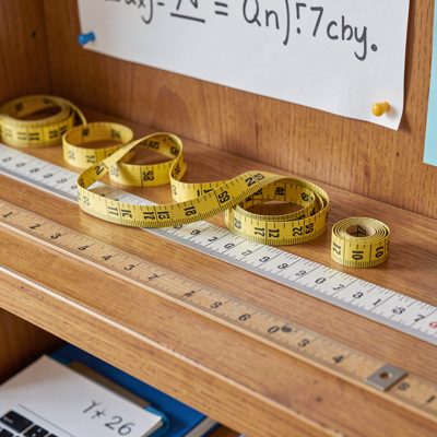 mathematics classroom measuring tape on ruler shelf