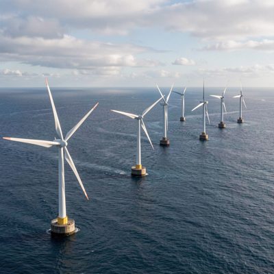 a wind farm seen from the sea