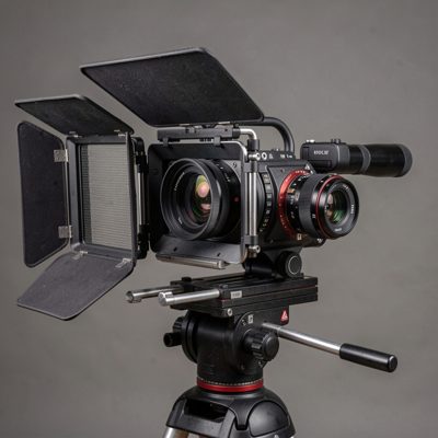 a full frame cinema camera built up with a matte box and rods