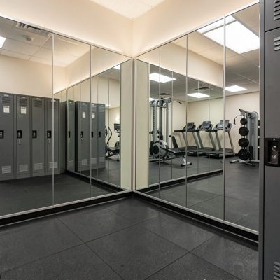 gym locker room showing mirrored surfaces for reflection