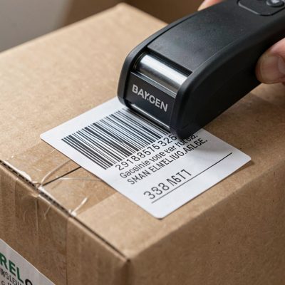 a barcode being scanned on a parcel