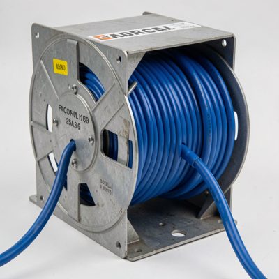 a spool of blue cat6 cable feeding from a payout box