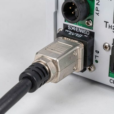 a console cable plugged into a switch management port