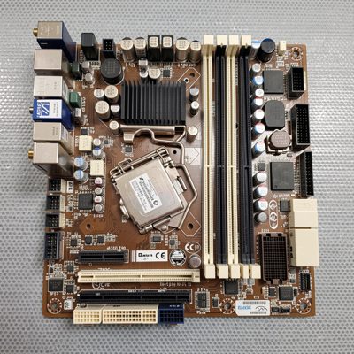 an atx motherboard laid flat on an antistatic mat