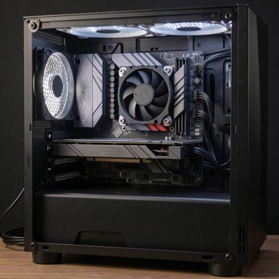a graphics card installed in a case lit from the side, no logos, no text, no branding