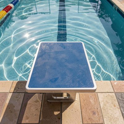 a swimming pool starting blocks from above