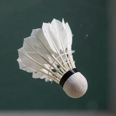 a badminton shuttlecock mid flight